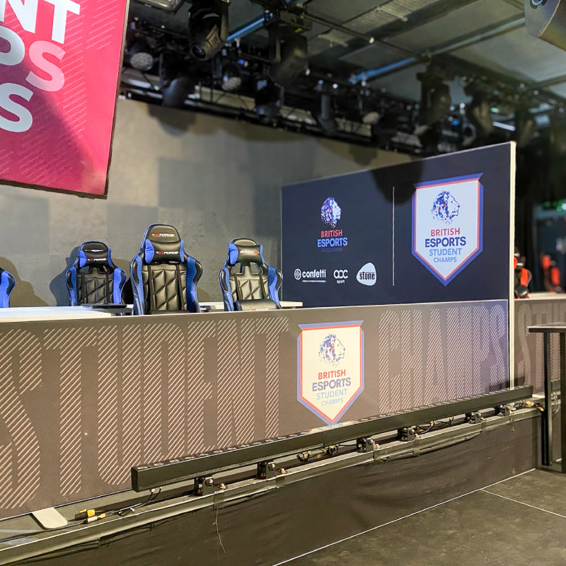 Stretch Fabric Displays used to cover the front of the gaming desk at an E-sports Event. There is also a divider between the two teams made from a custom prined stretch fabric display