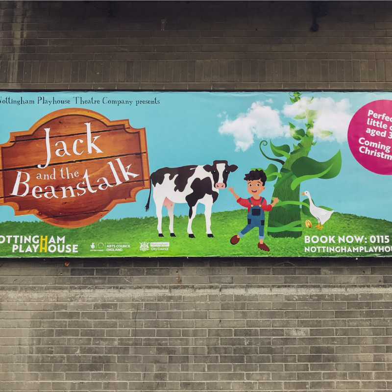 A billboard advertising Jack and the Beanstalk play.